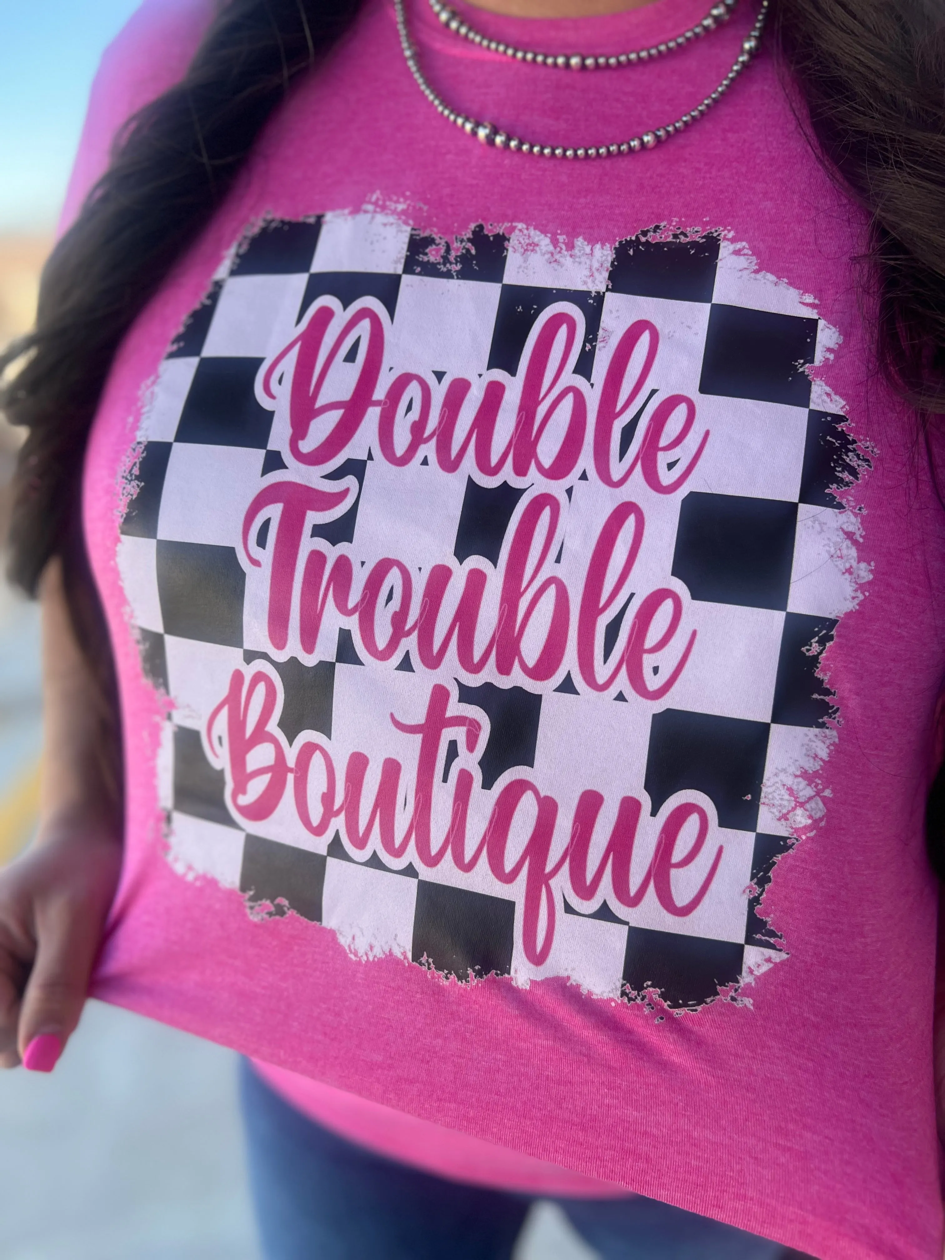 DOUBLE TROUBLE LOGO PROMO TEE - CHECKER PINK 3/3/25