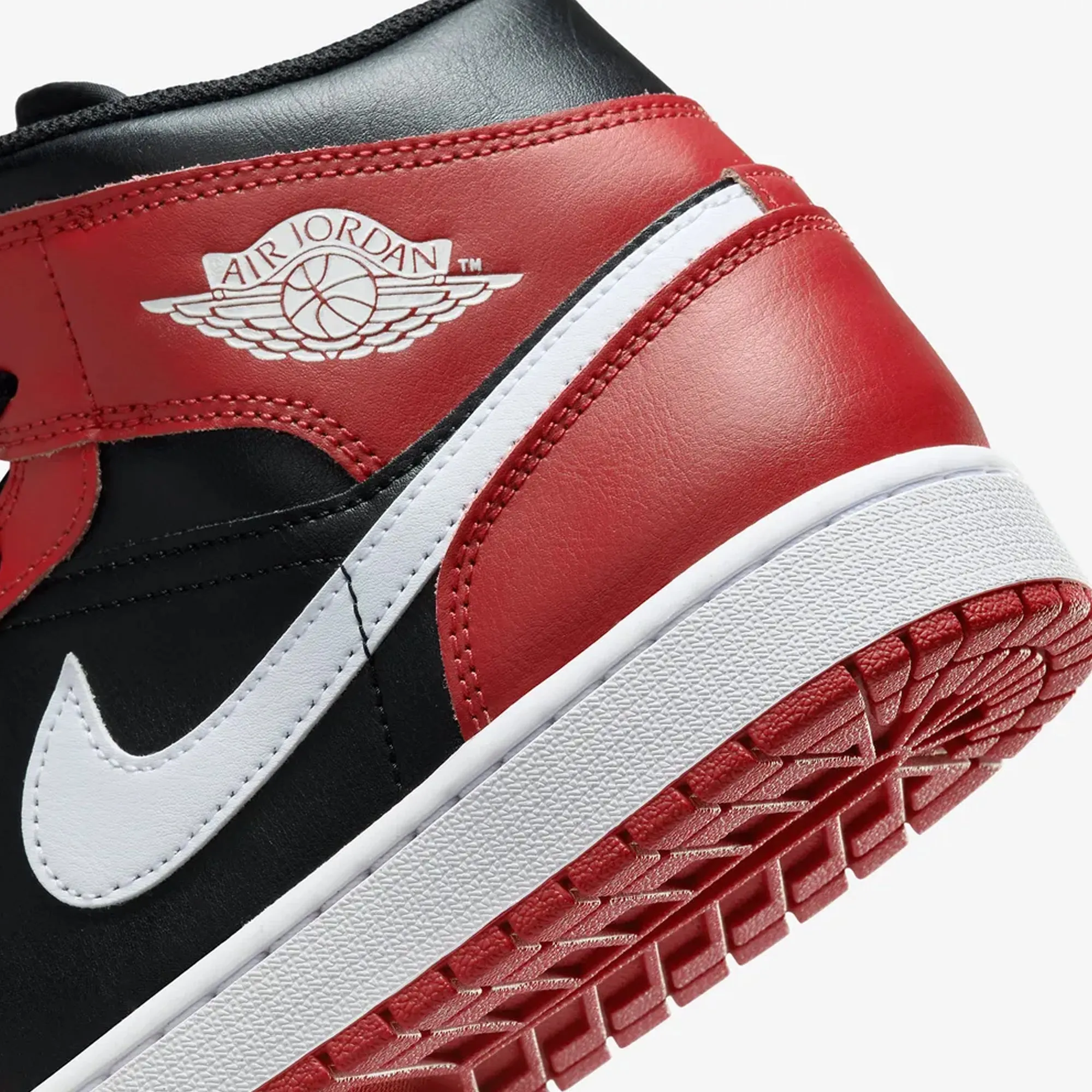 JORDAN | AIR JORDAN 1 MID { BLACK/WHITE-GYM RED